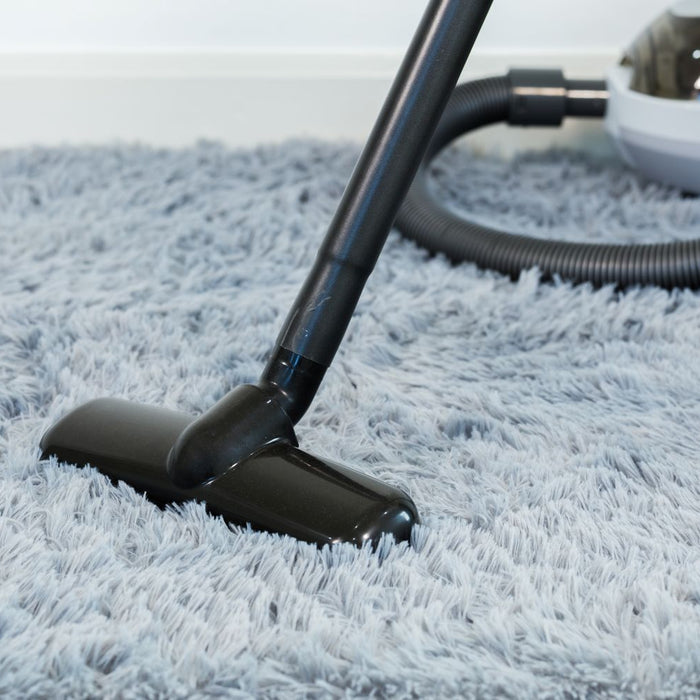 hoovering grey shaggy rug 