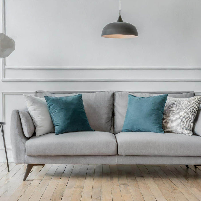 Grey Sofa on Wooden Flooring