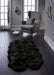 Origins sheepskins hug black Black Living Room Wool Rug.